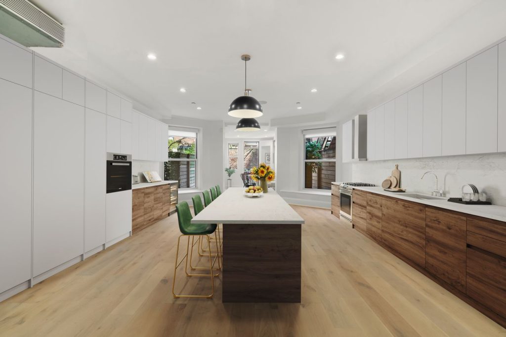 An upscale NYC kitchen remodel featuuring warm wood