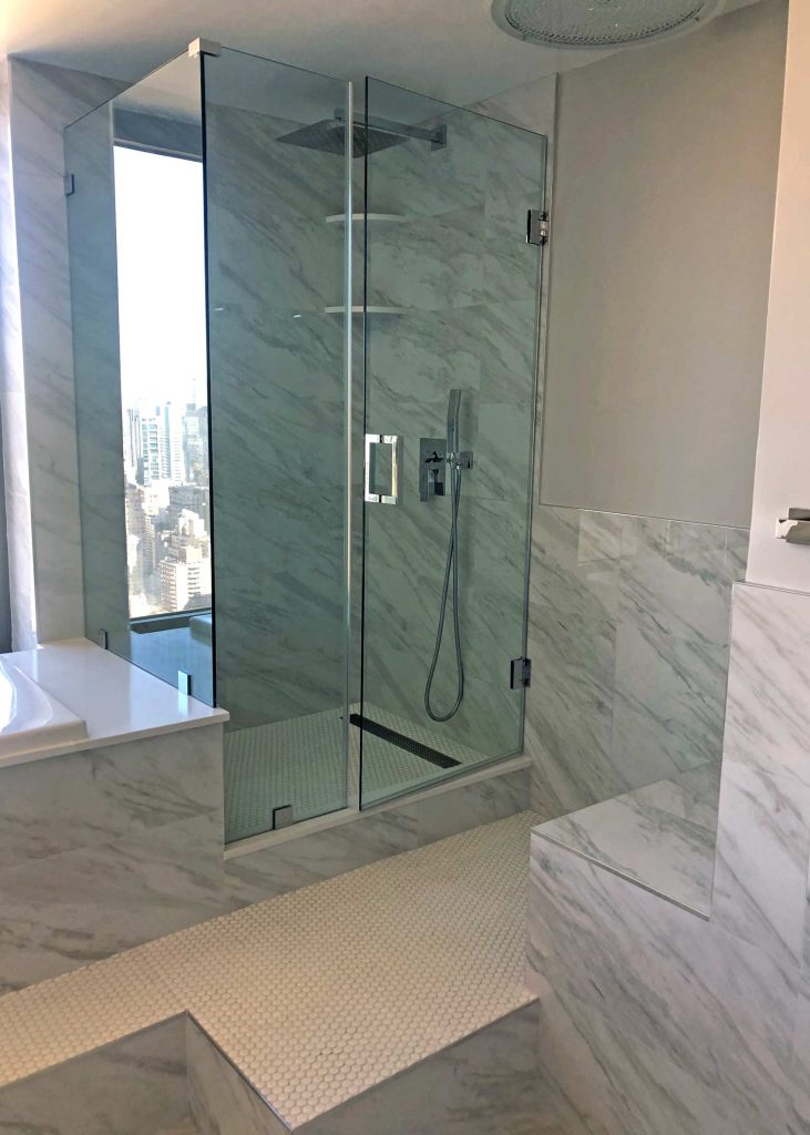 A NYC marble shower with a luxury view