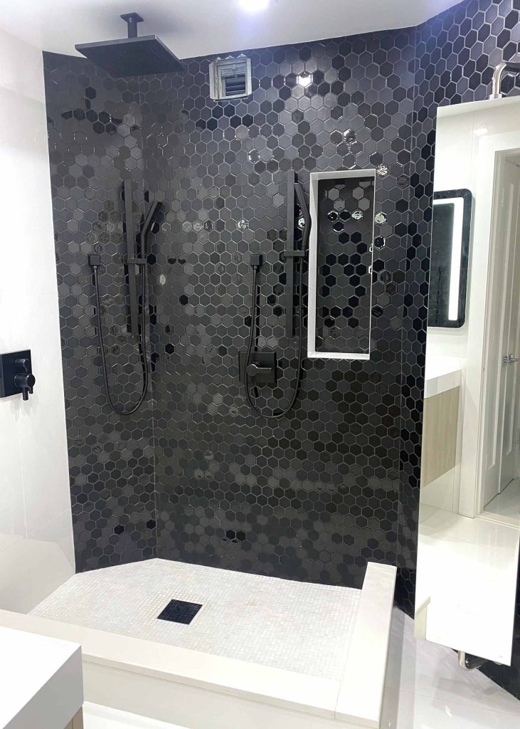 A stunning black luxury shower renovation
